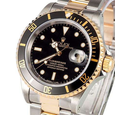 gold watch black face rolex|rolex submariner gold and black.